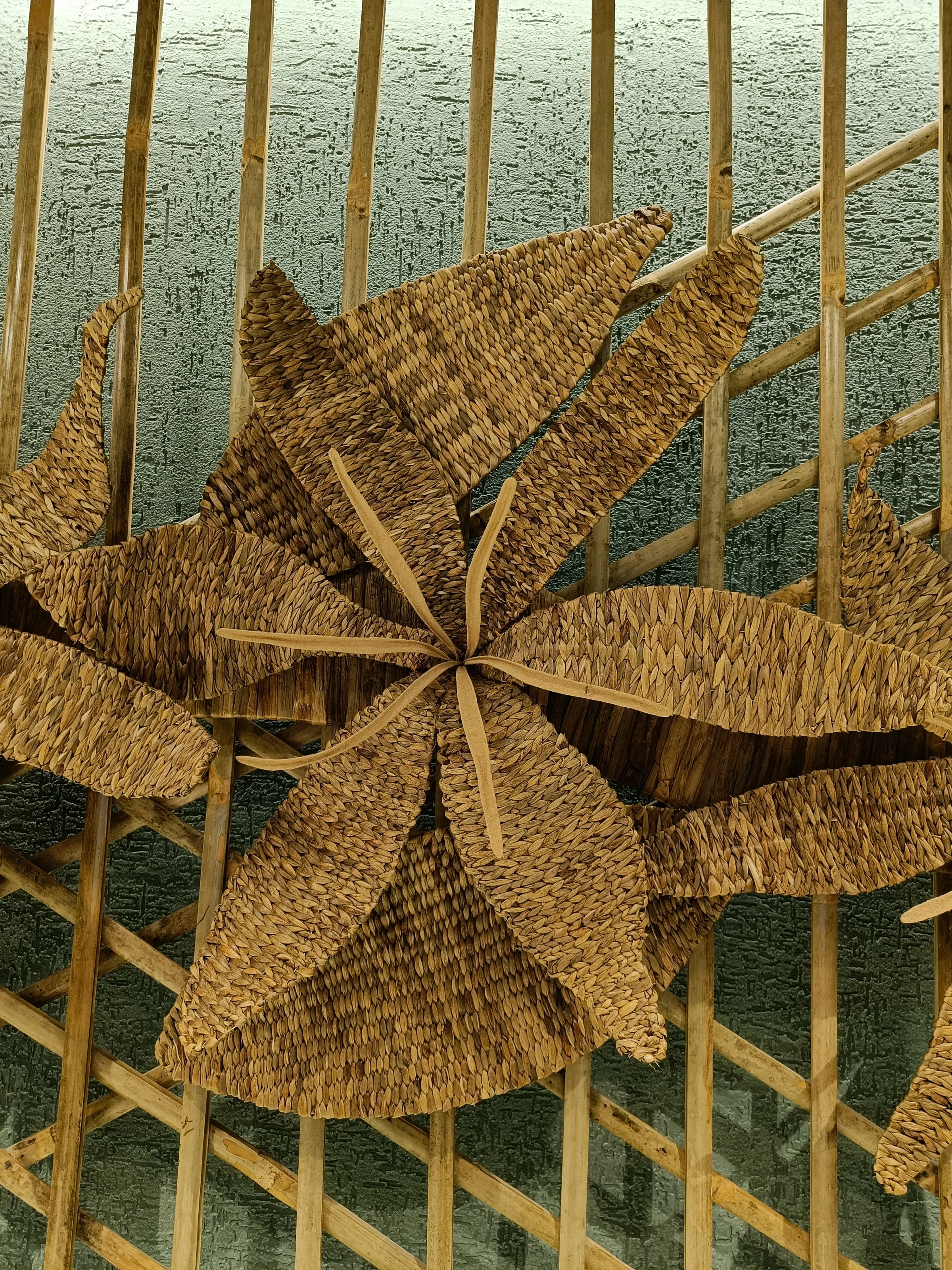 Detail of the cane and meteka coffee-flower weave at Starbucks GS Road, Guwahati